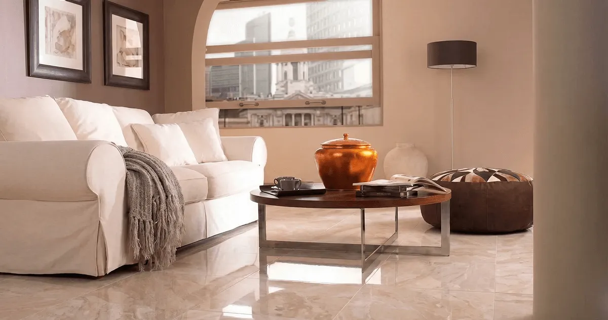 Modern living room with professionally installed marble flooring, a beige sofa, coffee table in Scottsdale, AZ