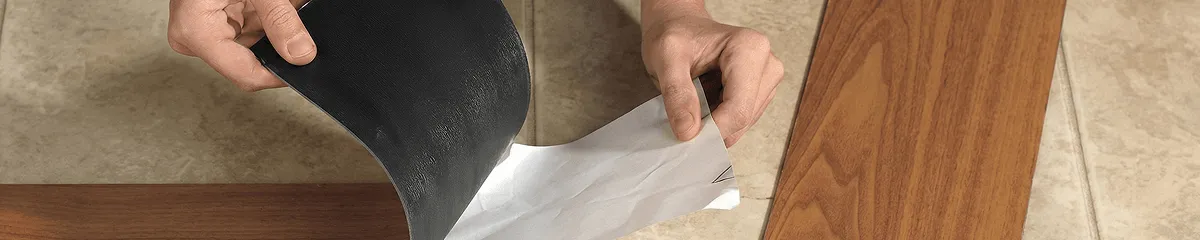 A professional installing vinyl flooring in Scottsdale, AZ